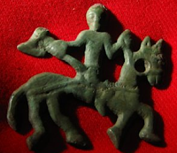 Horseman with an ax. Bronze.X-XI cent.