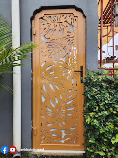 Pintu Kawat Nyamuk Besi Plat Cutting Laser terpasang di Rumah Bu Susi di Citeurep Bogor