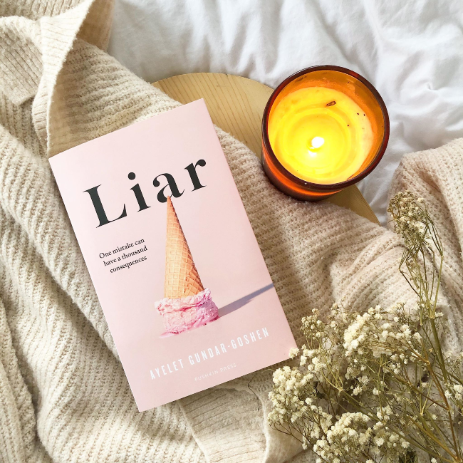 Front cover of 'Liar': a pale pink book with an upside down ice cream cone on the front