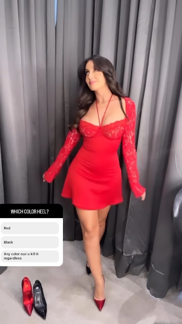 nora fatehi red short dress cleavage busty