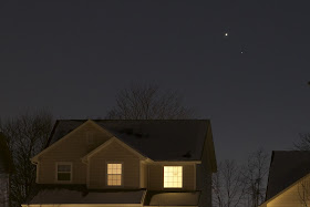 mars and venus over a house