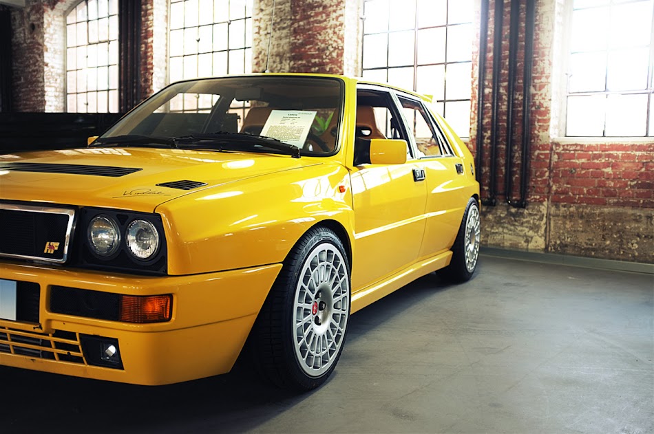 Lancia Delta HF Integrale Yellow legend pose in front of the camera at