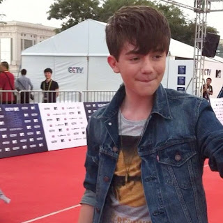 Greyson Chance biting his lip on the red carpet before MTV Awards in Beijing