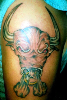 http://allaboutbodyart.blogspot.com/ bull_tattoo_arm_tattoo_designs