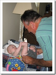 Reid & Uncle Billy.  For the record, he did NOT change a diaper...he swept in after the dirty work was done! ;)