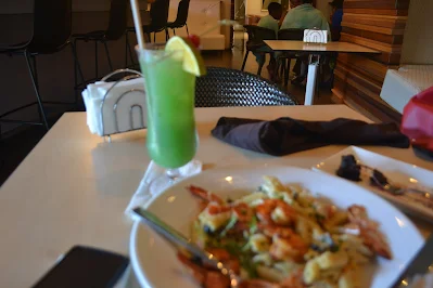 " Iguana cocktail and shrimp pasta from hotel Torarica in Suriname"