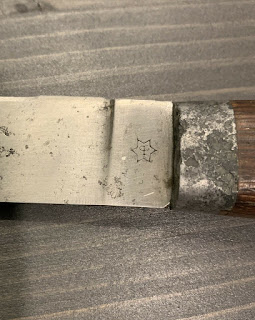 6 point star with symbol logo on knife