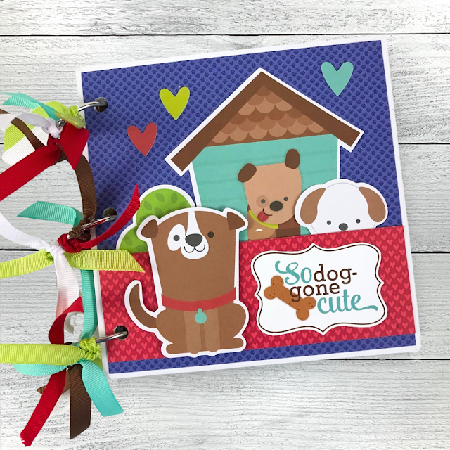 So Dog Gone Cute Scrapbook Album with colorful ribbons, hearts, dogs, and a doghouse