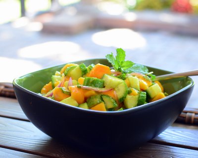 Cucumber-Mango Salad, another favorite summer salad ♥ KitchenParade.com with tiny spikes of honey & hot sauce.