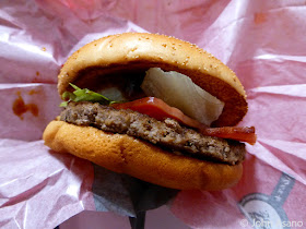 The Roasted Soy Sauce Style Bacon Tomato Thick Beef Burger unwrapped