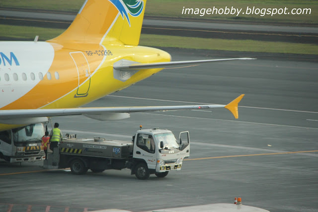 Cebu Pacific Air, Airplane, Flight, flying, Working, Ground Crew, Airport, Heavy, Wings, NAIA, Ninoy Aquino Internation Airport, International Airport