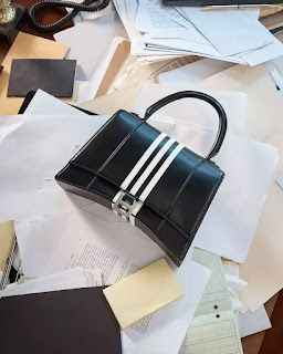one of Balenciaga bags was placed near a Supreme Court document from 2008 about child pornography laws.