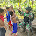 Kemanunggalan Satgas Pamtas Yonif 711/Rks Dengan Masyarakat Papua