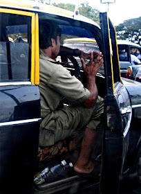 taxi driver waiting at red light