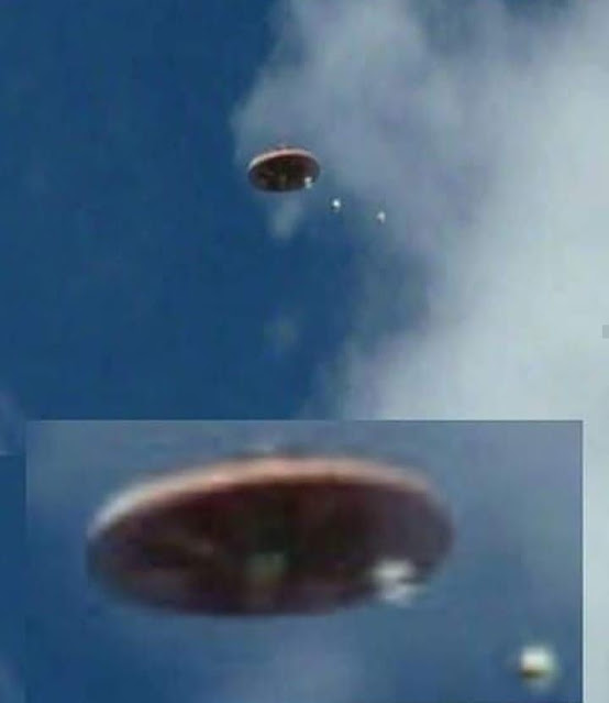 Flying Saucer dropping UFO Orbs which are white light looking balls.