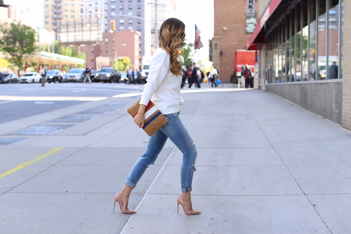 Shein White Lace Up Front Sweatshirt, lace up top, clare v Supreme Flat Clutch , blank denim distressed jeans, christian louboutin so kate pumps, quay sunglasses, nyc street style