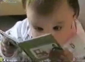 Funny baby reading book fast