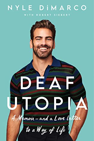 It is light aqua blue background with white lettering. On the front, Nyle DiMarco stands in a colorful striped shirt, smiling, on the front cover of his book "Deaf Utopia"