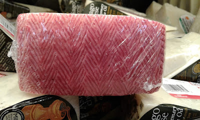 coral-colored cheese rind