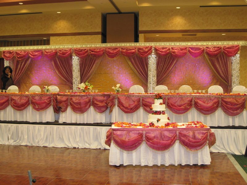 An Indian Wedding Reception Fuchsia Pink and Orange