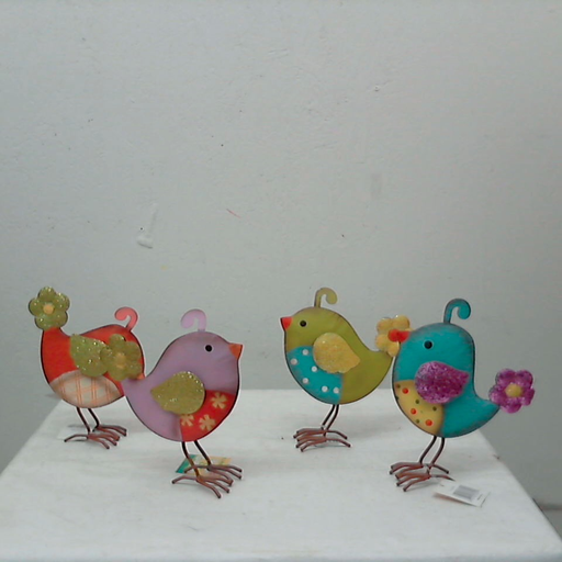 http://shop.tmigifts.com/metal-bird-with-glitter-wings-9-tall-4-styles-priced-per-each-212150/dp/6740