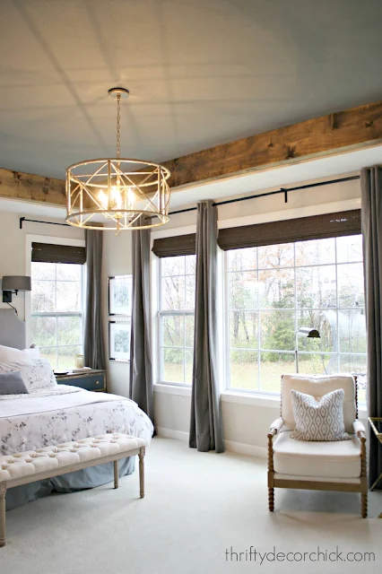 Painted tray ceiling with wood beams