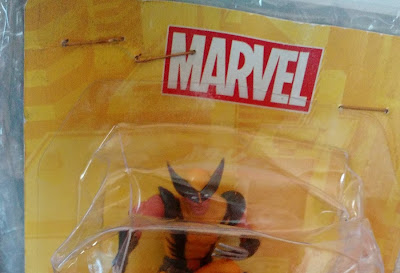 Boneco estático do Wolverine  - Marvel ,sobre base que é peça de xadrez, coleção de Agostini  R$ 30,00