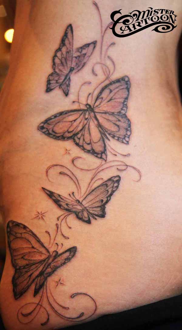 tattoo en su espalda Nessa eligi una bonita mariposa tattoo letras