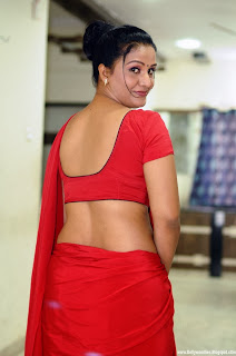 Apoorva Latest Red Saree HOT AND BOLD Looking Photoshoot Gallery