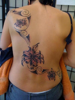 large lower back tattoos for women. Amazing Lower Back Tattoo