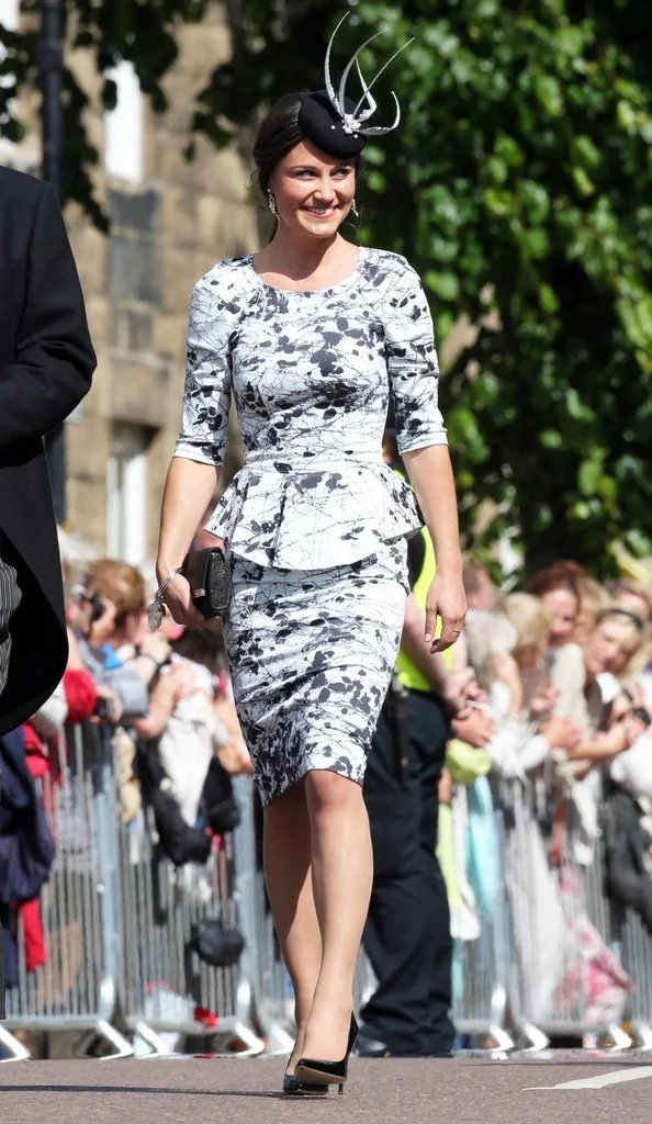 Pippa Middleton in a peplum dress at Lady Melissa Percy's wedding in Northumberland