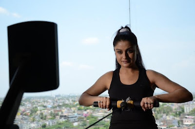 Sonia Agarwal hot gym stills