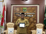 Saat Dikunjungi Kakan KPP Pratama I Padang, Suhatri Bur Ajak Seluruh ASN Laporkan SPT Tahunan dan Pemadanan NIK Sebagai NPWP.