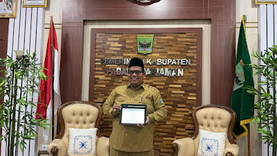 Saat Dikunjungi Kakan KPP Pratama I Padang, Suhatri Bur Ajak Seluruh ASN Laporkan SPT Tahunan dan Pemadanan NIK Sebagai NPWP.