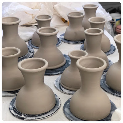 All bowls are with thrown footed pedestal and are upside down on a table drying. These will remain this way for a day or so, until they are dry enough to turn right side up