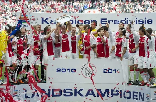 Ajax Amsterdam players celebrate after winning the Eredivisie title