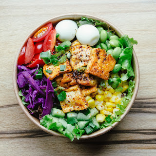 salad bowl with salmon and boiled eggs