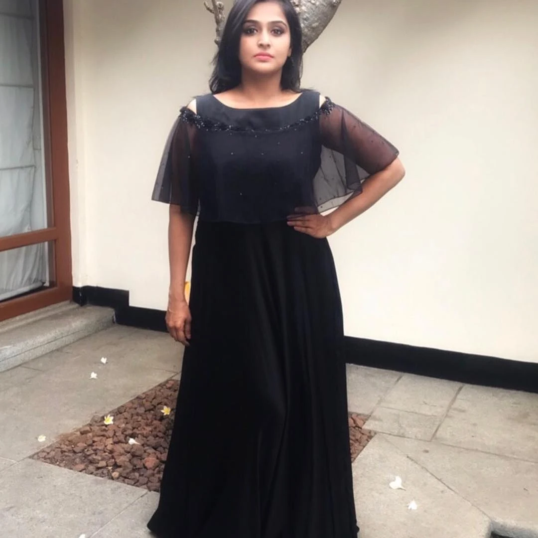 Actress Ramya Nambeesan Wet In Black Dress Pics