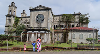 People looking at old church in Puriscal.