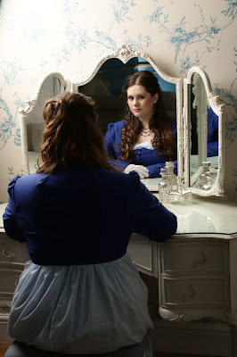 Sophie Andrews looking in the mirror