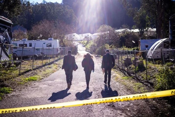 After a shooter killed seven people at two agricultural enterprises in Half Moon Bay, California, US investigators from the Federal Bureau of Investigation (FBI) approach the crime site.