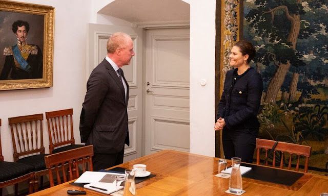 Crown Princess Victoria wore a navy blue gold buttons tweed jacket by Maruschka de Margo. Climate Ambassador Mattias Frumerie