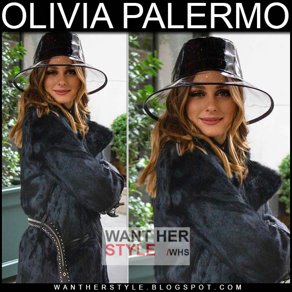 Olivia Palermo in black fur coat and pvc bucket hat
