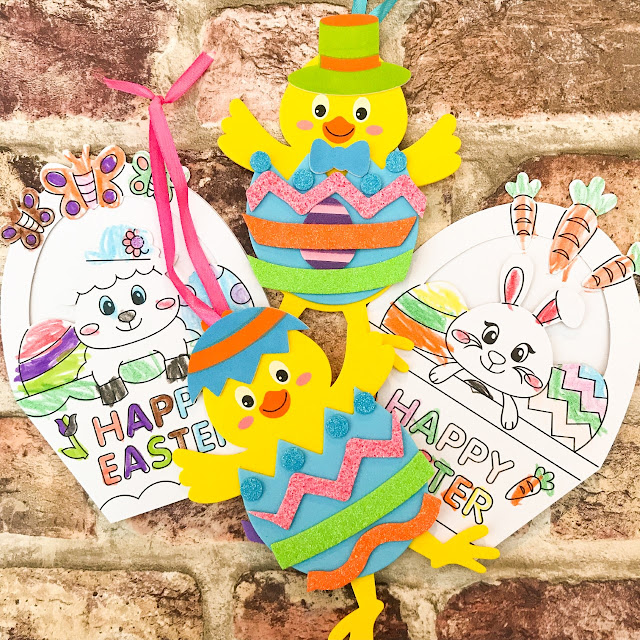 Two easter cards coloured in by a child and two hanging easter decorations