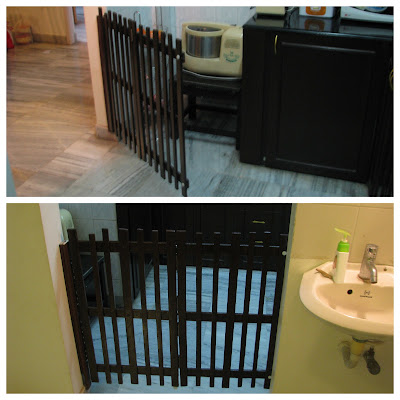 baby proofing the kitchen using child safe door barrier