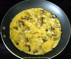 step one Cheesy Scrambled Eggs with Mushrooms and Onions