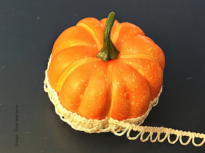 Vintage, Paint and more... gluing the buttonhole trim around a dollar store pumpkin to make a lacy vintage pumpkin for fall