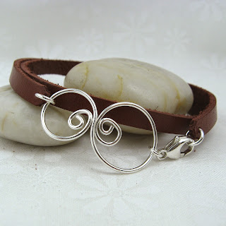 http://www.cloverleafshop.com/doodle-leather-wrap-bracelet-p/doodle.brbl.htm