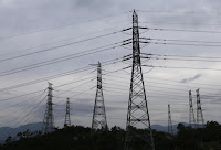 Power transmission towers are seen near the plant of new Shin Kori No. 3 reactor and No. 4 reactor of state-run utility Korea Electric Power Corp (KEPCO) in Ulsan, about 410 km (255 miles) southeast of Seoul, September 3, 2013. (Credit: Reuters/Lee Jae-Won) Click to Enlarge.