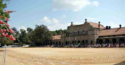 "School on Sports Day, main field of the school."